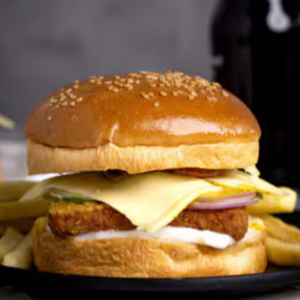 "A juicy burger with a perfectly cooked patty, fresh lettuce, tomato, cheese, and pickles, all sandwiched between a soft, toasted bun."